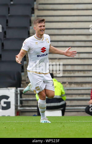 Milton Keynes, UK. 7th Sep, 2019. Rhys Healey celebrates after scoring for MK Dons, to extend their lead making it 2 - 0 against AFC Wimbledon, during the Sky Bet League 1 match between MK Dons and AFC Wimbledon at Stadium MK, Milton Keynes on Saturday 7th September 2019. (Credit: John Cripps | MI News) Editorial use only, license required for commercial use. Photograph may only be used for newspaper and/or magazine editorial purposes Credit: MI News & Sport /Alamy Live News Stock Photo