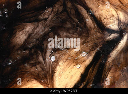 Abstract colorful chaotic swirly shapes on black background. Fantasy golden fractal texture. 3D rendering. Stock Photo