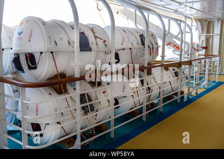 Safety at sea, Independence of the seas life boat lifeboat containers Royal Caribbean cruise ship inflatable lifeboats rafts containers Stock Photo