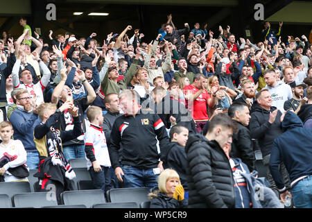 Milton Keynes, UK. 7th Sep, 2019. MK Dons fans celebrate after winning against AFC Wimbledonafter the Sky Bet League 1 match between MK Dons and AFC Wimbledon at Stadium MK, Milton Keynes on Saturday 7th September 2019. (Credit: John Cripps | MI News) Editorial use only, license required for commercial use. Photograph may only be used for newspaper and/or magazine editorial purposes Credit: MI News & Sport /Alamy Live News Stock Photo