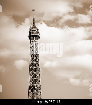 Eiffel Tower with clouds and sepia toned effect in Paris France Stock Photo