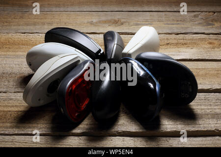 Computer Mouses on Wooden Background Stock Photo