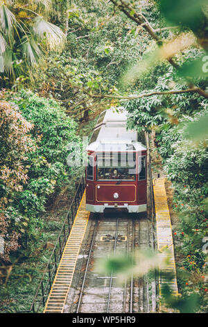 Hong Kong peak tram to Victoria Peak, one of the popular attraction for tourists. Stock Photo