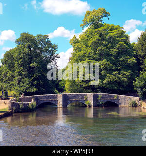 Medieval Sheepwash Bridge over the River Wye at Ashford in the Water Derbyshire UK Stock Photo