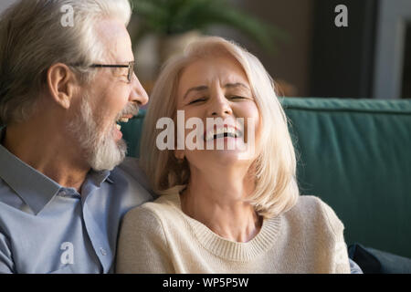 Laughing happy positive senior family couple close up. Stock Photo