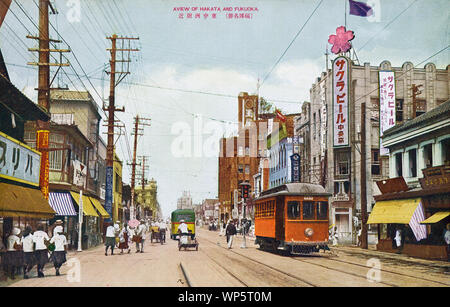 [ 1920s Japan - Japanese Streetcar in Fukuoka City ] —   A streetcar on Higashi Nakasu in Fukuoka City, Fukuoka Prefecture.  The big sign on the right advertises Sakura Beer. Therefore the cherry blossom mark on top of the building.  20th century vintage postcard. Stock Photo