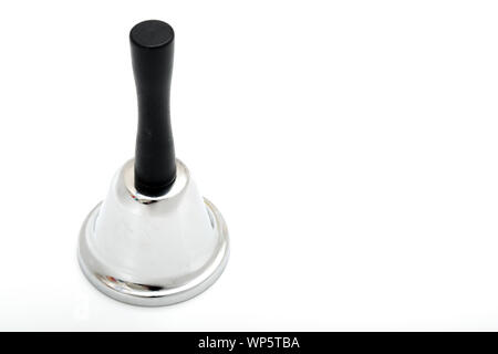 A butler ringing a hand bell for service, focus on hand Stock Photo - Alamy