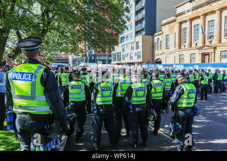 Glasgow, UK 07 September 2019. The Pro-Republican, Pro Irish group, the Calton Republicans marched through Glasgow's east end from Millroad Street to Clyde Street and stopped at the anti fascist statue celebrating the people of Glasgow who fought against Franco in the Spanish civil war. After the recent and significant street disturbances in Govan between sectarian groups there was a heavy police presence to prevent any disorder. Credit: Findlay/Alamy News Stock Photo