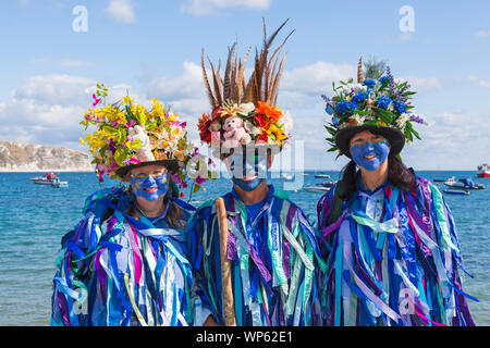 Swanage, Dorset UK. 7th September 2019. Crowds flock to the seaside town of Swanage to enjoy the dancing, with over 50 dance teams including morris dancing for Swanage Folk Festival. Morris dancers - members of Exmoor Border Morris. Credit: Carolyn Jenkins/Alamy Live News Stock Photo