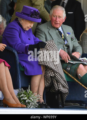 Image ©Licensed to i-Images Picture Agency. 07/09/2019. Braemar, United Kingdom. The Queen attends The Braemar Gathering.  HM Queen Elizabeth II accompanied by Prince Charles, The Prince of Wales, Duchess of Cornwall, Autumn and Peter Philips attend the 2019 Braemar Gathering in Braemar, Scotland.  Picture by Andrew Parsons / Parsons Media Stock Photo