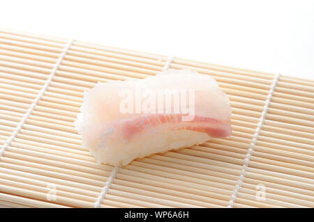 sushi of red snapper closeup isolated on white background Stock Photo