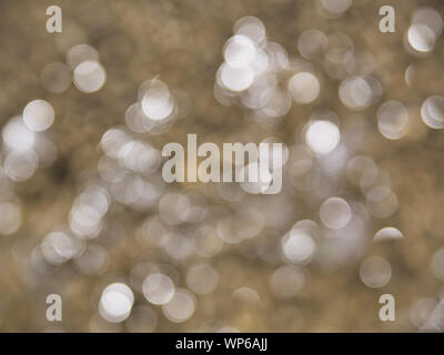 Defocused abstract blurred image with sparkle circular light reflections. Nice bokeh effect. Stock Photo