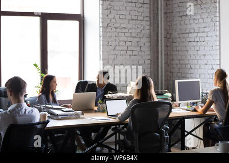 Businesspeople employees working in modern office, using computers Stock Photo