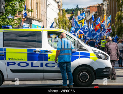 Perth, Scotland, United Kingdom, 7th September 2019. All Under One Banner Independence March: Independence supporters march through Perth in the 7th All Under One Banner (AUOB) march of this year. A police van Stock Photo