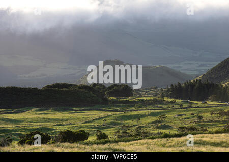 Sunrise over the volcanic central countryside of Ilha do Pico Island, Azores, Portugal Stock Photo
