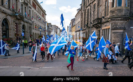 Perth, Scotland, United Kingdom, 7th September 2019. All Under One Banner Independence March: Independence supporters march through Perth in the 7th All Under One Banner (AUOB) march of this year. The march on the High Street Stock Photo