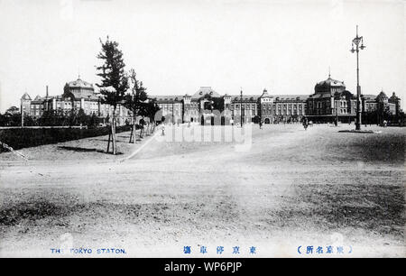 [ 1910s Japan - Tokyo Station ] —   An unusual view of Tokyo Station, Tokyo.  Located in the Marunouchi business district of Tokyo, near the Imperial Palace grounds and the Ginza commercial district, the building was designed by architect Kingo Tatsuno (辰野金吾, 1854–1919) to celebrate Japan’s victory in the Russo-Japanese War.  He patterned the domes, destroyed during the firebombings of 1945 (Showa 20), after Amsterdam’s central station.  The station was completed on December 18, 1914 (Taisho 3), and opened on the 20th.  20th century vintage postcard. Stock Photo