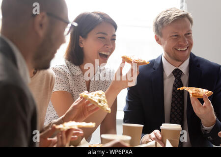 Close up young korean female employee bursting in laugh. Stock Photo