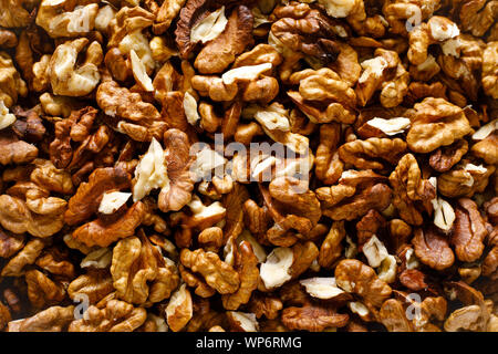 Walnuts. Kernels nuts background, top view Stock Photo