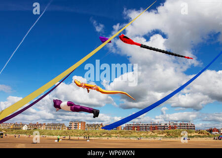 Lytham St Annes on Sea, Lancashire. UK Weather. 7th September, 2019. The rescheduled Lytham Kite festival gets underway on the pristine beaches of the Fylde coast. The display teams were faced with light onshore winds at the start of the day's spectacle as thousands of people are expected to attend the Autumn event. Credit; Credit: MediaWorldImages/Alamy Live News Stock Photo