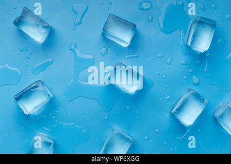 Big frozen ice cubes on an iced lake with snow and sunshine around Stock  Photo - Alamy