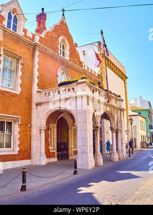 Principal facade of The Convent, Governors Residence. View from Main street. Gibraltar downtown. BOT, UK. Stock Photo