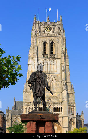 Statue of Ambiorix (prince of the Eburones) and the 13th-century Gothic Basilica of Our Lady at the Market Square in Tongeren, Belgium Stock Photo