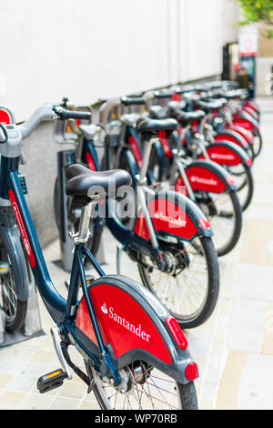 Santander Cycles parked in a docking station, London Stock Photo