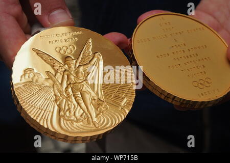 Model of the gold medals that will be used in the Olympic Games Paris ...