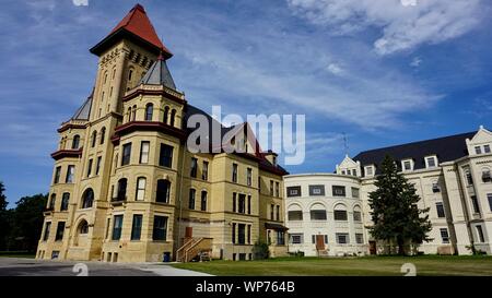 Kirkbride Building, Fergus Falls State Hospital, former mental asylum, now empty, USA National Register of Historic Places, Fergus Falls, Minnesota. Stock Photo