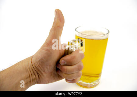 Glass mug of beer in man's hand on white background Stock Photo