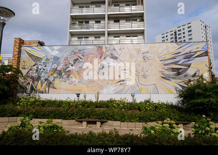 Socialist mosaic wall designed by Walter Womacka titled Peace in Marzahner Promenade brutalist neighbourhood of Berlin Stock Photo