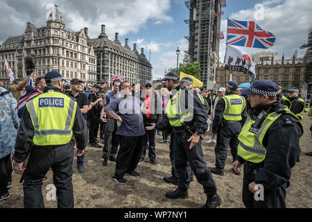 London, UK. 7th September, 2019. Pro-Brexit nationalist demonstrators gather in Parliament Square, part organised by the Democratic Football Lads Alliance (DFLA), to protest against “Boris Johnson’s coup against the democratic process”. Metropolitan police would later confirm there had been skirmishes and said 16 arrests had been made in connection with the protests, mainly for violent disorder. Credit: Guy Corbishley/Alamy Live News