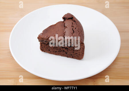 Piece Of Chocolate Cake Gateau Chocola On A Plate Isolated On Table Stock Photo Alamy