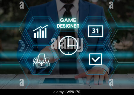 Handwriting text writing Game Designer. Conceptual photo Campaigner Pixel Scripting Programmers Consoles 3D Graphics Male human wear formal work suit Stock Photo