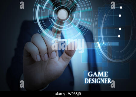 Handwriting text Game Designer. Conceptual photo Campaigner Pixel Scripting Programmers Consoles 3D Graphics Male human wear formal work suit presenti Stock Photo