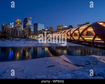 CALGARY, CANADA - JAN 23: the Peace Bridge on January 23, 2016 in Calgary, Alberta Canada. The pedestrian bridge spans the Bow River and was designed Stock Photo