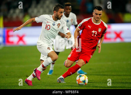 Belgrade. 7th Sep, 2019. Portugal's Bernardo Silva (L) competes during the UEFA EURO 2020 Qualifying Round Group B match between Serbia and Portugal in Belgrade, Serbia on Sept. 7, 2019. Credit: Predrag Milosavljevic/Xinhua Stock Photo