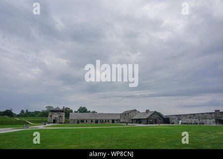 Porter, New York, USA: Visitors on the 23-acre grounds of the 18th-century Old Fort Niagara, on a cloudy day. Stock Photo