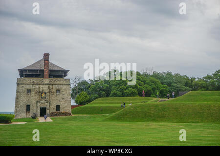 Porter, New York, USA: Visitors at the North Redoubt on the 23-acre grounds of Old Fort Niagara, on a cloudy day on Lake Ontario. Stock Photo