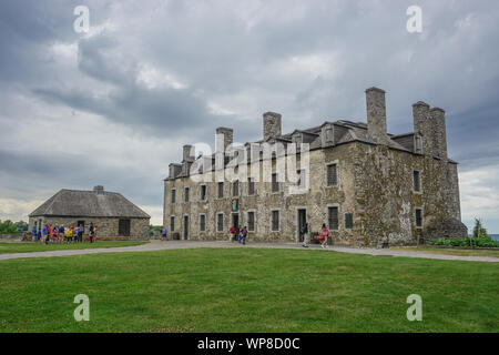 Porter, New York, USA: Visitors at the 18th-century 'French Castle' on the 23-acre grounds of Old Fort Niagara, on a cloudy day. Stock Photo