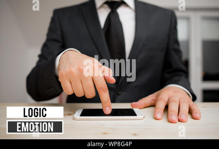 Conceptual hand writing showing Logic Emotion. Concept meaning Unpleasant Feelings turned to Self Respect Reasonable Mind Stock Photo