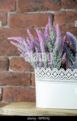 Lavender flowers in white flowerpot Stock Photo