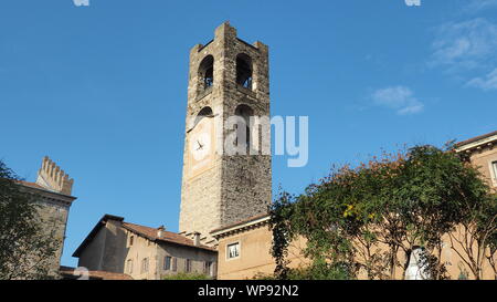Bergamo, Italy. The old town. Landscape at the clock tower called Il Campanone. It is located in the main square of the upper town Stock Photo