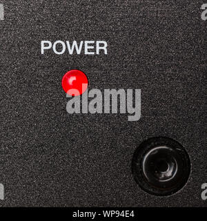Power indicator, red led on metal panel Stock Photo