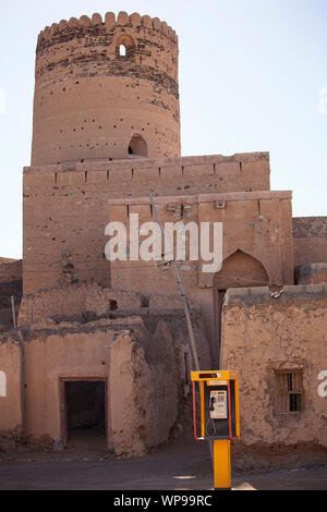 Telephone cabin in front of tower, Oman Stock Photo