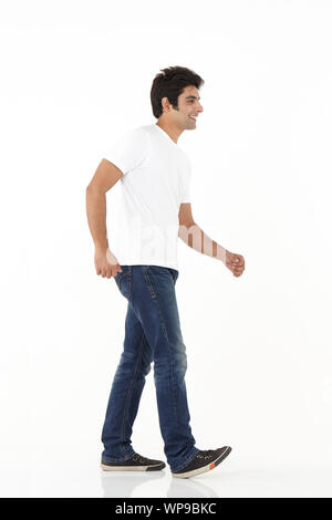 Stepping out. an young man with one leg walking on crutches in a gym Stock  Photo - Alamy