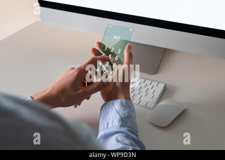 Man uses a futuristic transparent phone Stock Photo