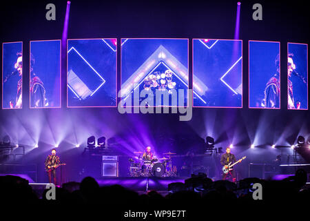 Oslo, Norway. 7th, September 2019. The English rock band Muse performs a live concert at Telenor Arena in Oslo. Here singer, songwriter and musician Matthew Bellamy is seen live on stage with the rest of the band. (Photo credit: Gonzales Photo - Terje Dokken). Stock Photo