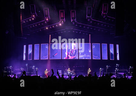 Oslo, Norway. 7th, September 2019. The English rock band Muse performs a live concert at Telenor Arena in Oslo. Here singer, songwriter and musician Matthew Bellamy is seen live on stage with the rest of the band. (Photo credit: Gonzales Photo - Terje Dokken). Stock Photo